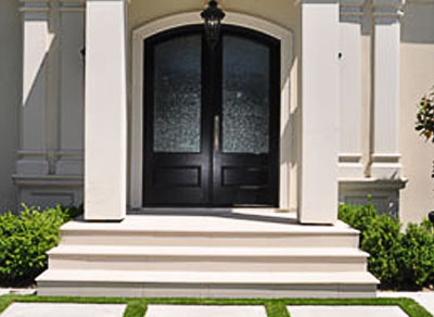 Front door stairs built with porcelain stair tiles