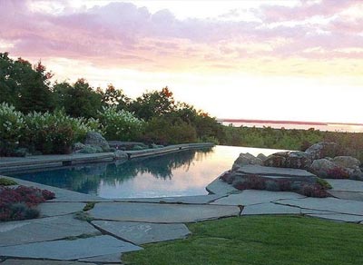 Bluestone laid on ground around pool